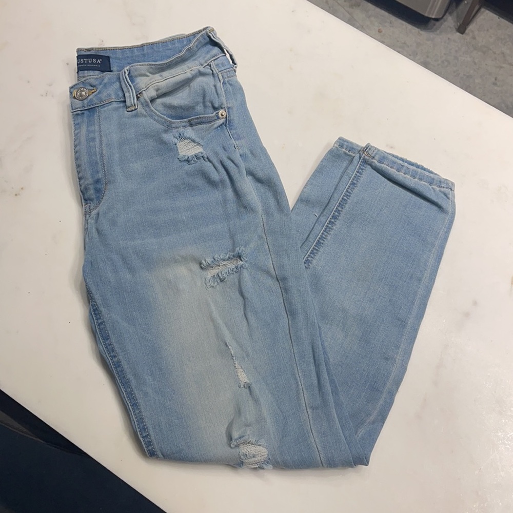 Distressed light blue skinny jeans size 7